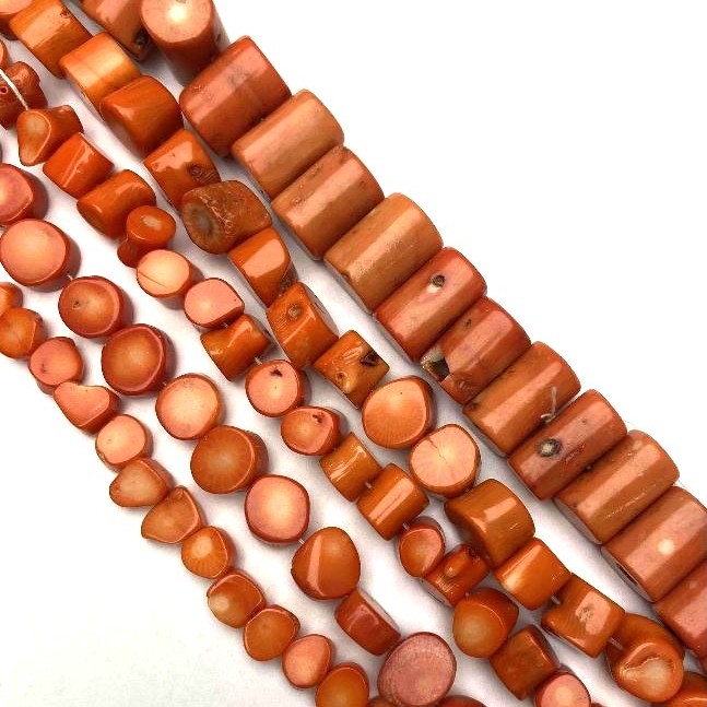 Beads of natural orange coral, faceted, diameter 12×10 mm, length 39 mm ± (price per 100 g).