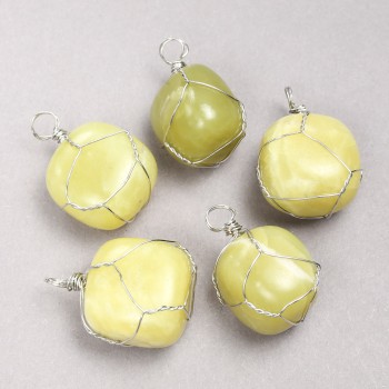 Pendant in a silver weave with natural Jadeite stone, diameter 35x20 mm+
