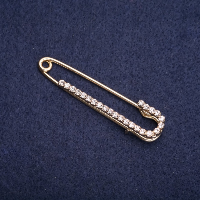 Brooch pin with white rhinestones 57×13 mm, gold-tone metal