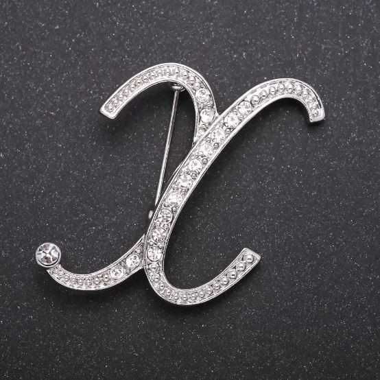 Initial X brooch with white crystals, gray metal finish, 43x38 mm