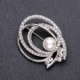 Pearl brooch in white-silver metal color 57 x 30 mm