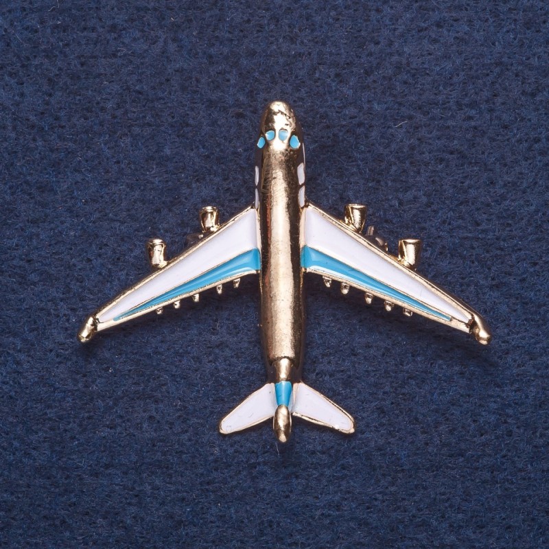 Brooch "Plane" white and blue enamel, gold-tone metal, 4x5 cm