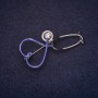 Brooch 'Stethoscope' 25x53 mm enamel with crystals blue and white silver-tone metal
