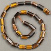 Beads on thread, natural Tiger's Eye, faceted 11x7 mm, length 40 cm+