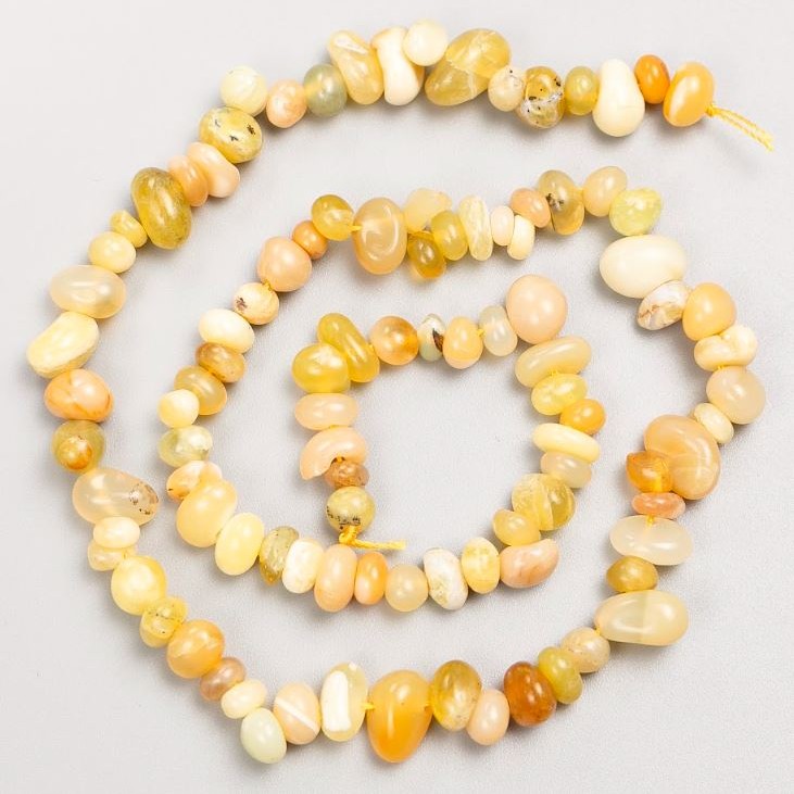 Beads on a cord of natural stone Yellow Agate, tumbled 7×5 mm, length 41 cm