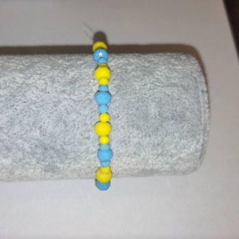 Bracelet 'Ukraine' with Czech crystal 'faceted rondelle' on elastic, diameter 6×4 mm ±, diameter 3×2 mm ±, length 18 cm ±