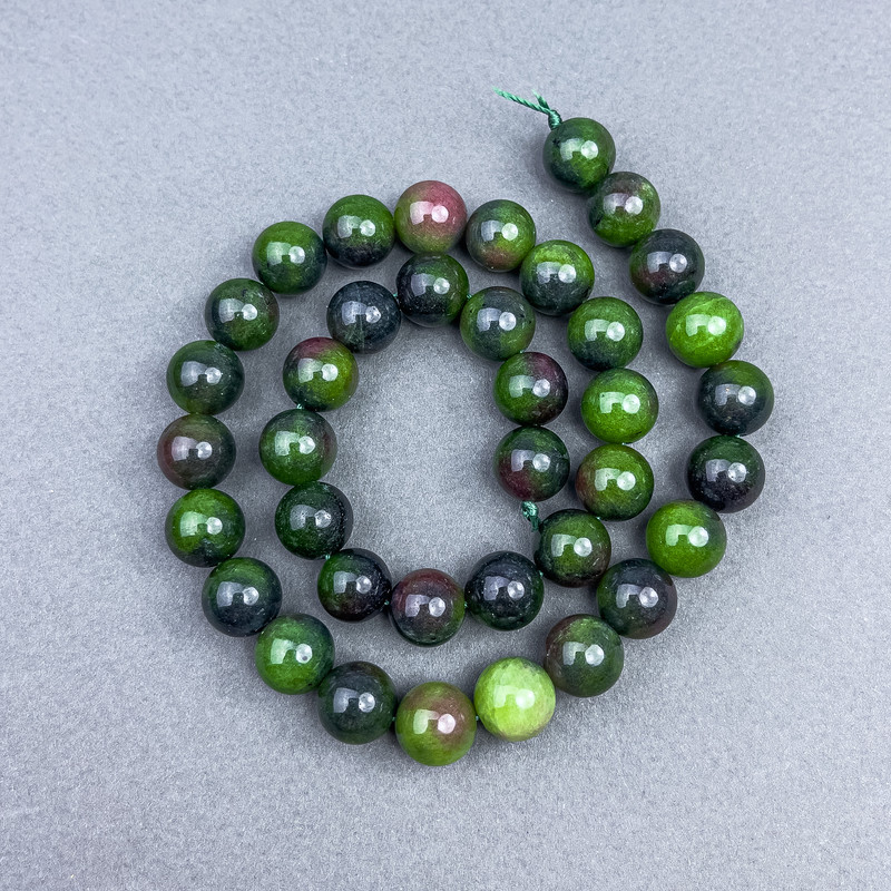 Zoisite beads, smooth spheres, 10.5 mm diameter, on thread, 39 cm length