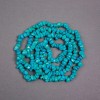 Turquoise beads on a string (artificial) light blue crystal chips, diameter 7x6x4mm +/-, length 78 cm +/-