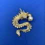 Dragon Brooch in Golden Metal, white crystals, white bead, 45x64 mm
