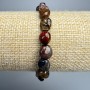 Petersite bracelet, natural, faceted, 8x10 mm diameter, length 18 cm ± (stretch)