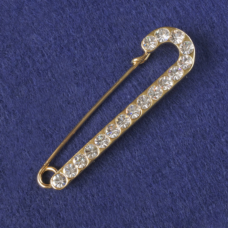 Brooch-pin with white crystals, golden metal 72x20mm+