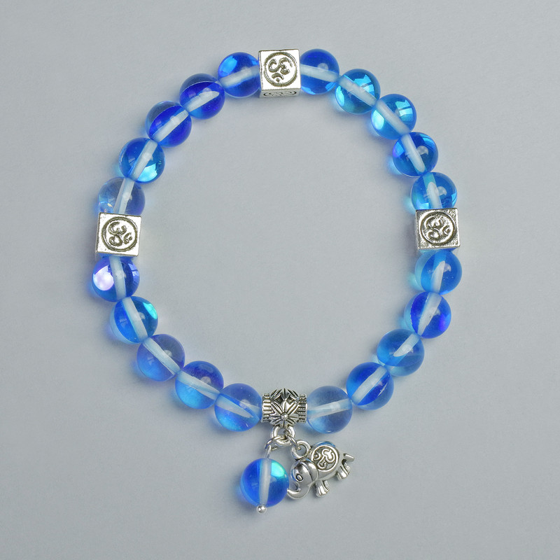 Bracelet made of blue transparent opal glass, 8 mm diameter ± (stretch), length 18 cm ±, with metal inserts
