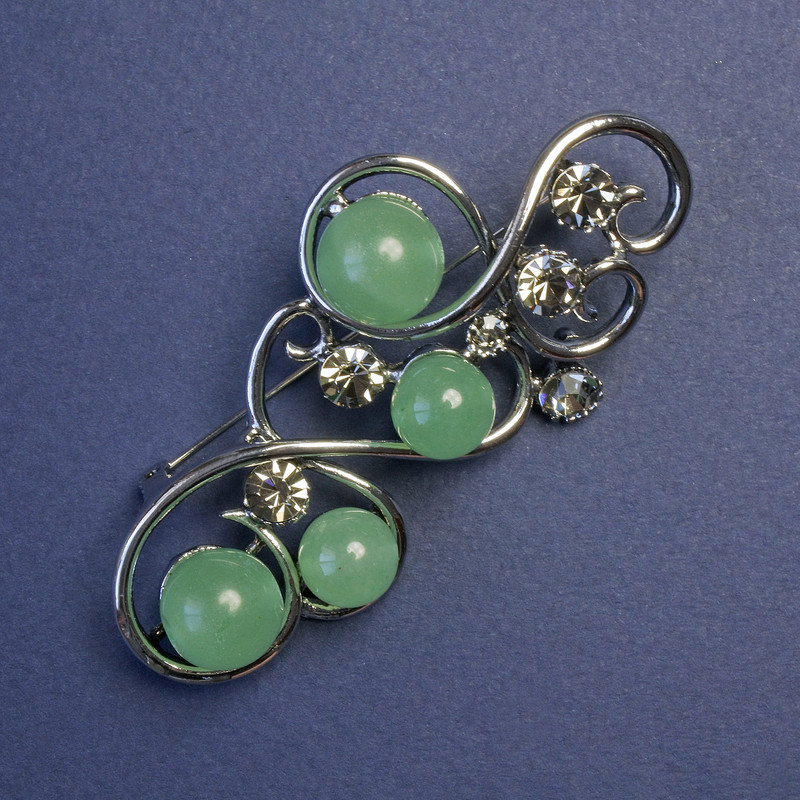 Brooch with Nephrite and Gray Crystals