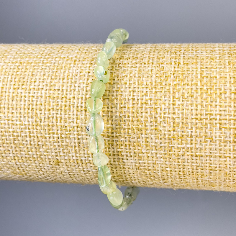 Prehnite bracelet, faceted beads, 6×5 mm diameter, 18 cm length, stretch
