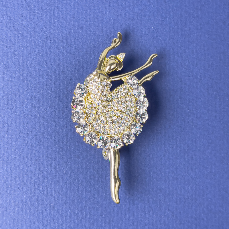 Brooch 'Ballerina' with white rhinestones, 51×26 mm, gold-tone metal