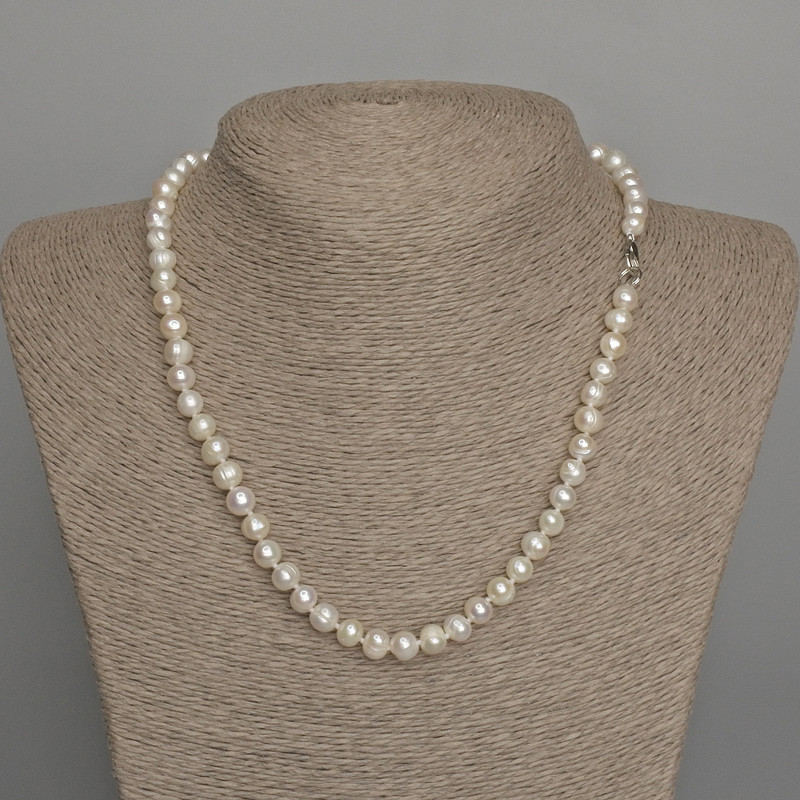 Necklace of natural freshwater pearls, 7x6 mm, length 45 cm, with a clasp