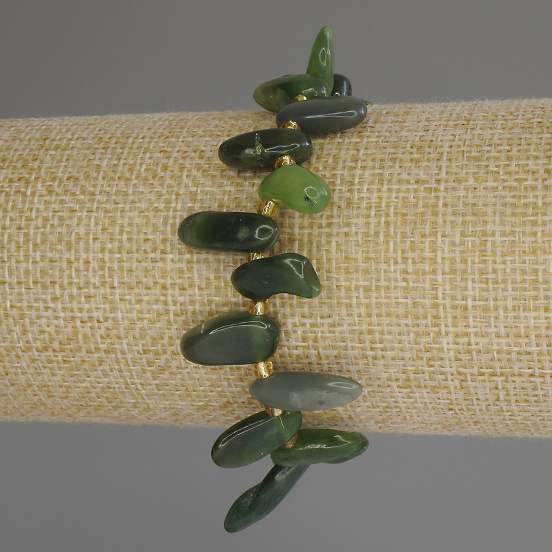 Jadeite bracelet with faceted beads, 'Butterfly', diameter 12-17×6 mm ±, with 3 mm seed beads ±, length 18 cm (stretch)