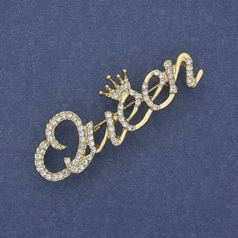 Accent Brooch 'Queen' with crystals, Golden metal 48x16mm+