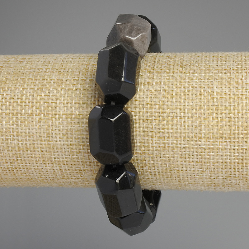 Bracelet with natural obsidian, silver-toned faceted stones, diameter 20 × 15–16 mm, length 18 cm